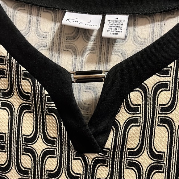 Never worn ladies top. 3/4 sleeves in black and tan geometric pattern. - Picture 3 of 3